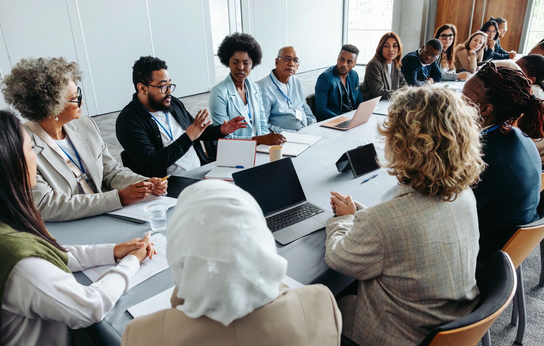 A professional discussion around a boardroom table